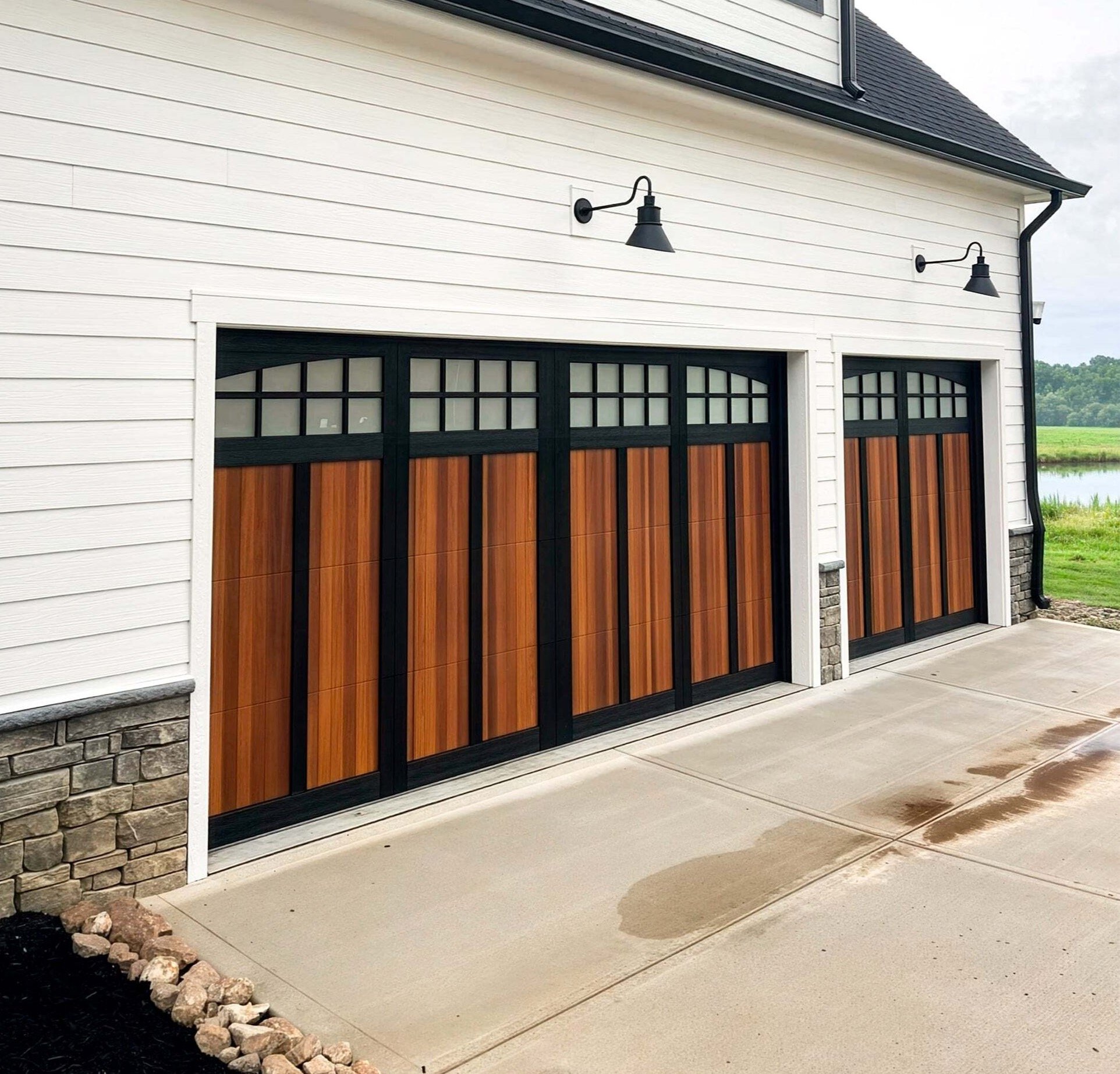 shoreline 2 tone black overlay garage doors cedar
