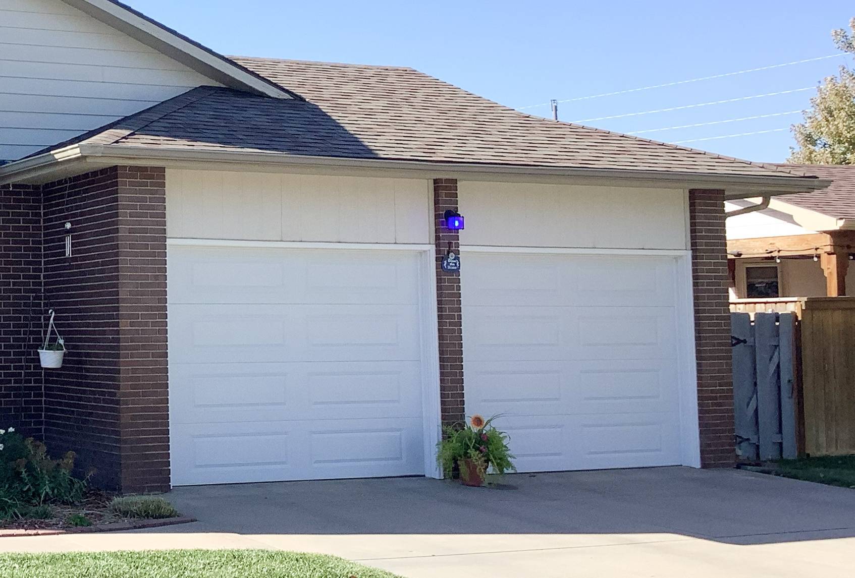 Raised panel garage door in white
