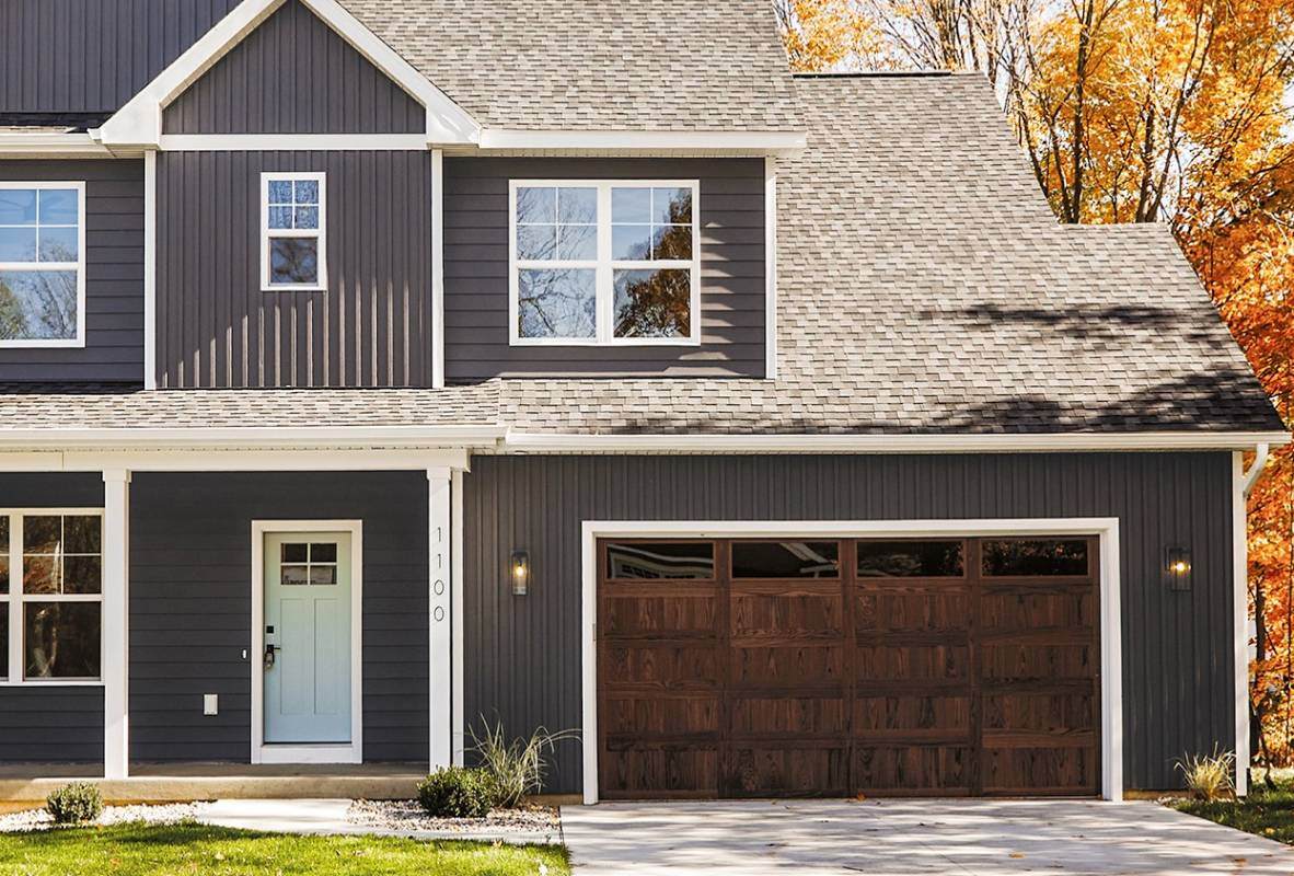 carriage garage doors in dark oak grey house