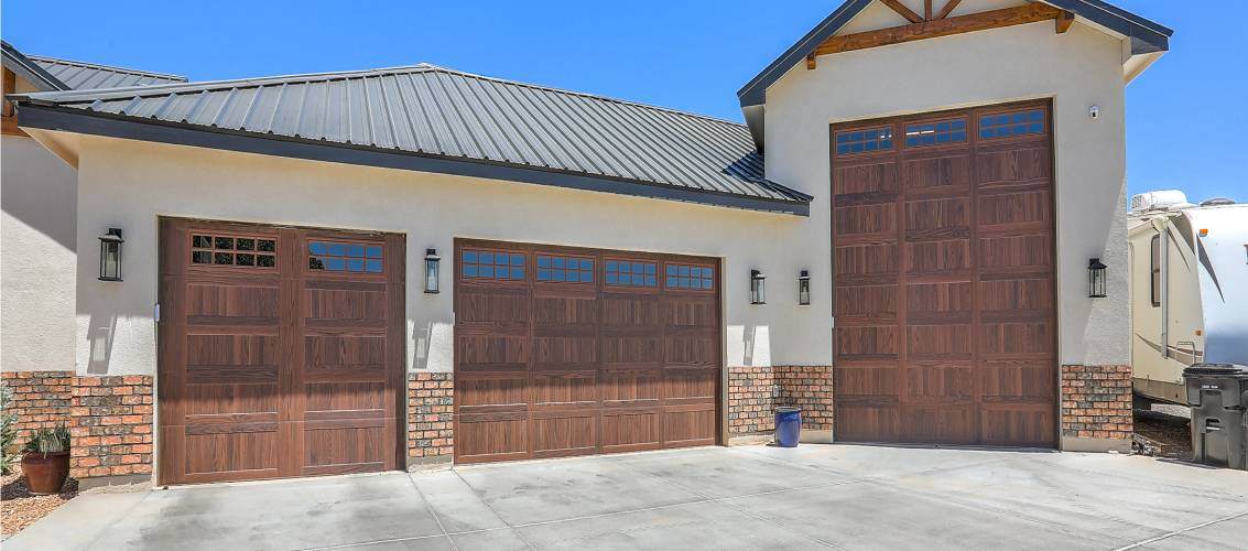 carriage garage doors in dark oak