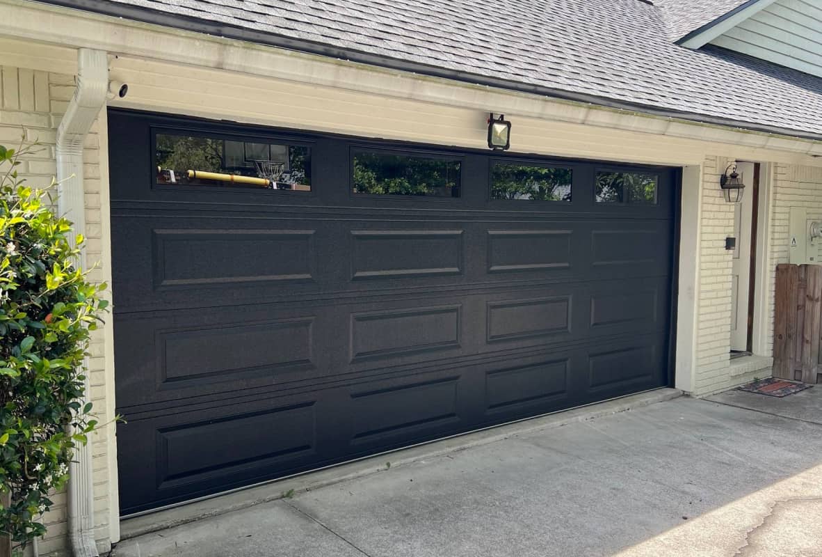 Raised panel black garage doors
