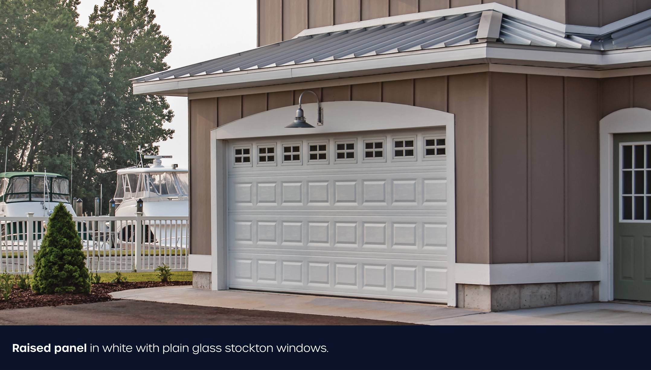 Raised panel garage door in white
