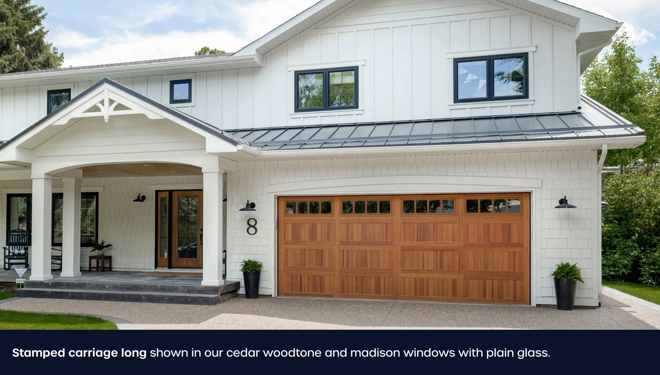 Stamped carriage garage door long in cedar woodtone