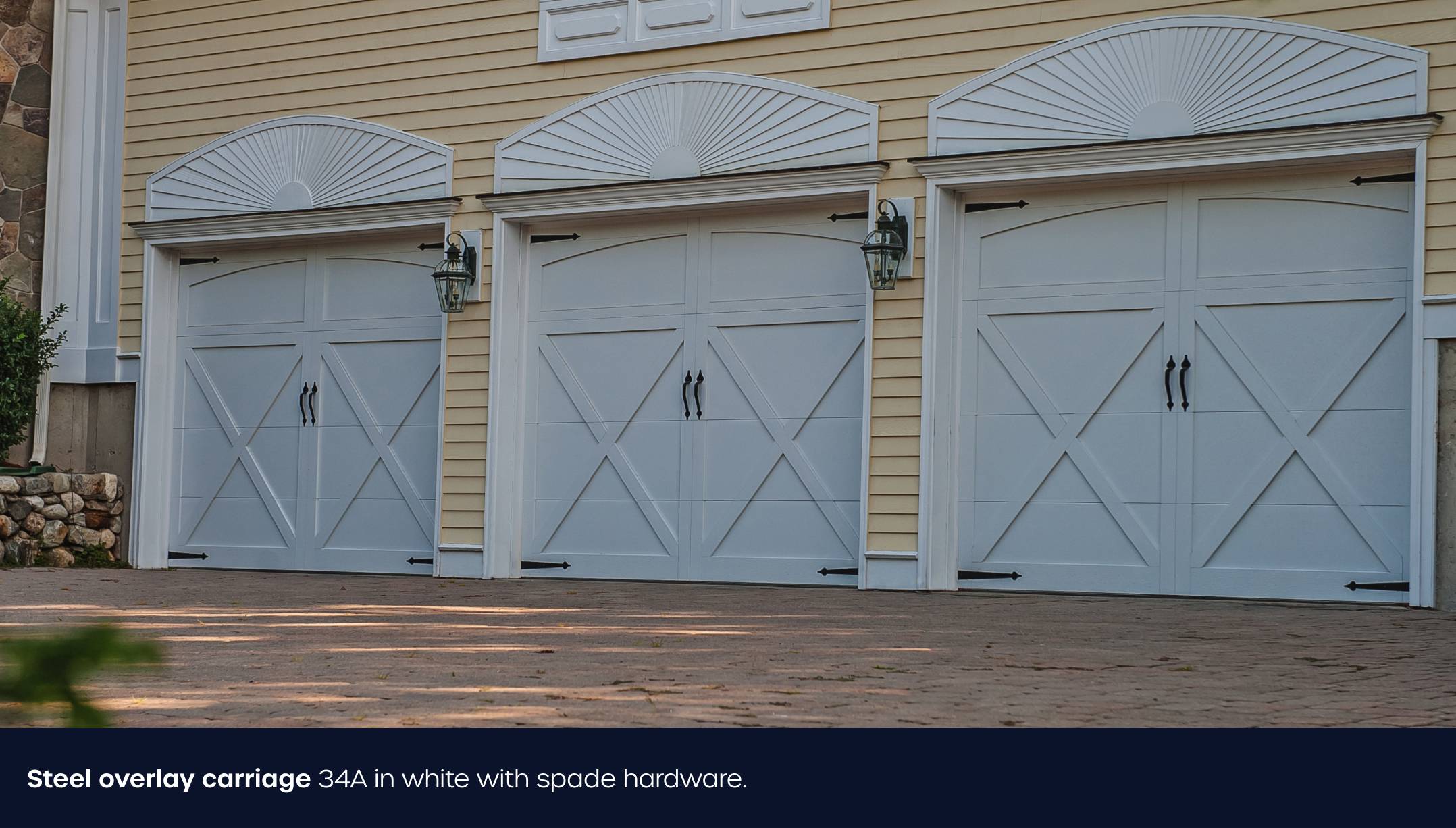 Steel Overlay Carriage garage door in white