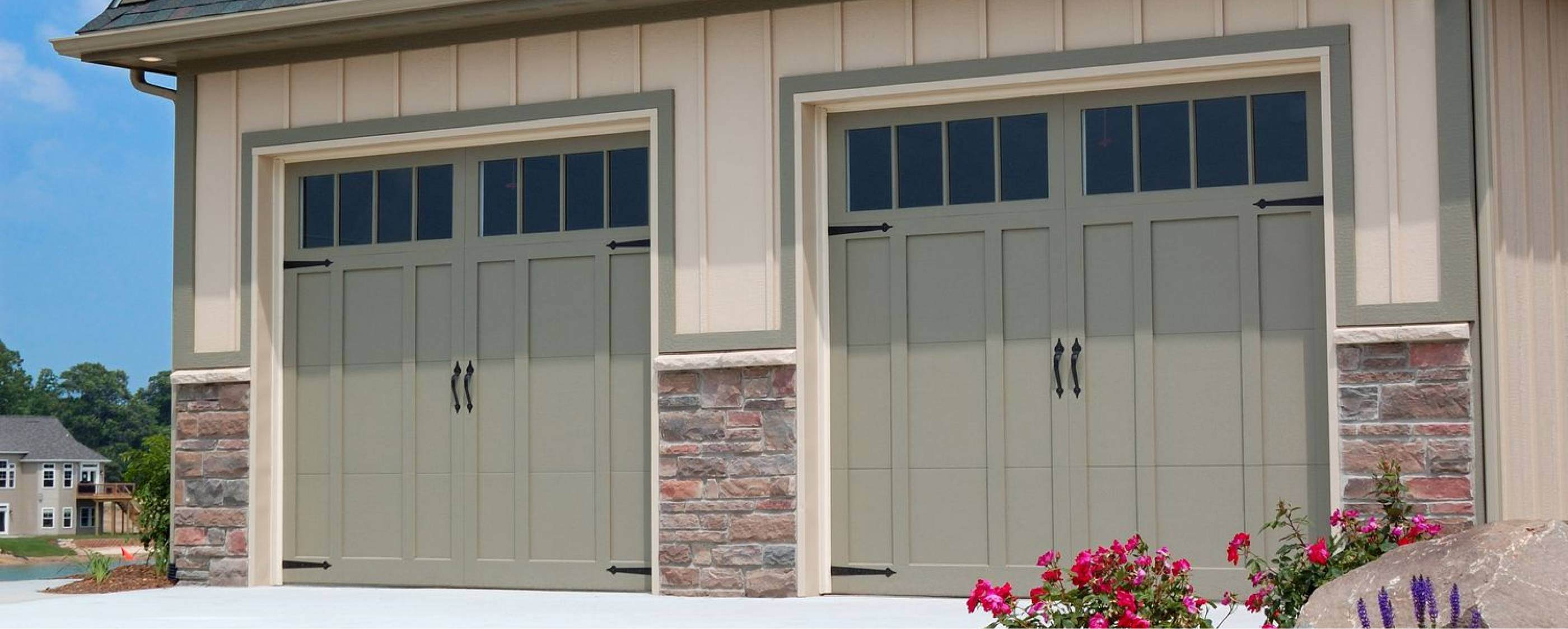 Overlay carriage house garage doors in pastel green