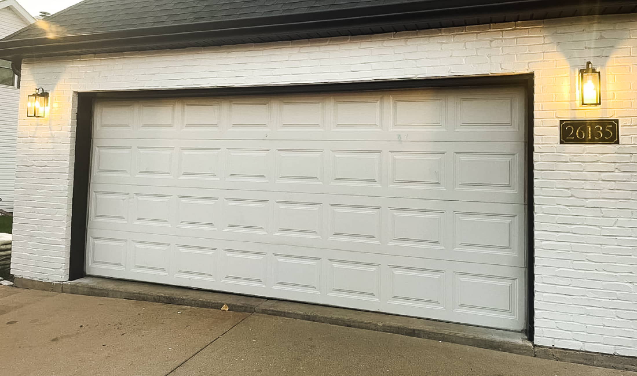 Garage doors transformation before - Black Raised Panel