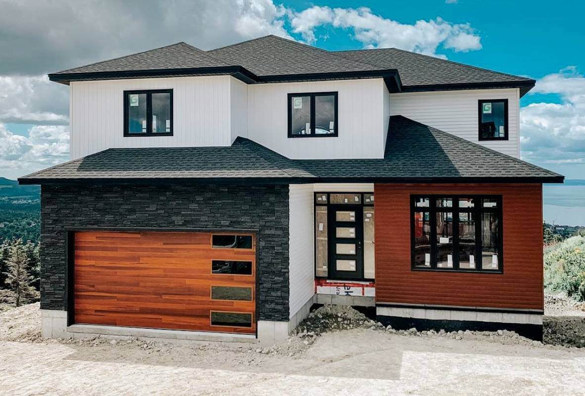 Planks garage door in cedar woodtone mid-century house