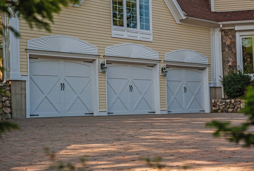 Overlay carriage house garage doors white