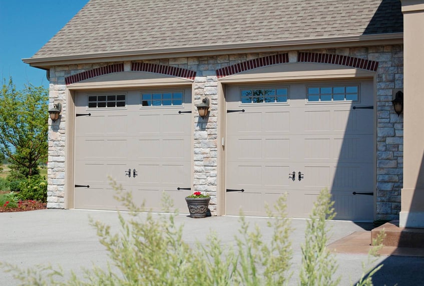 Stamped carriage garage doors