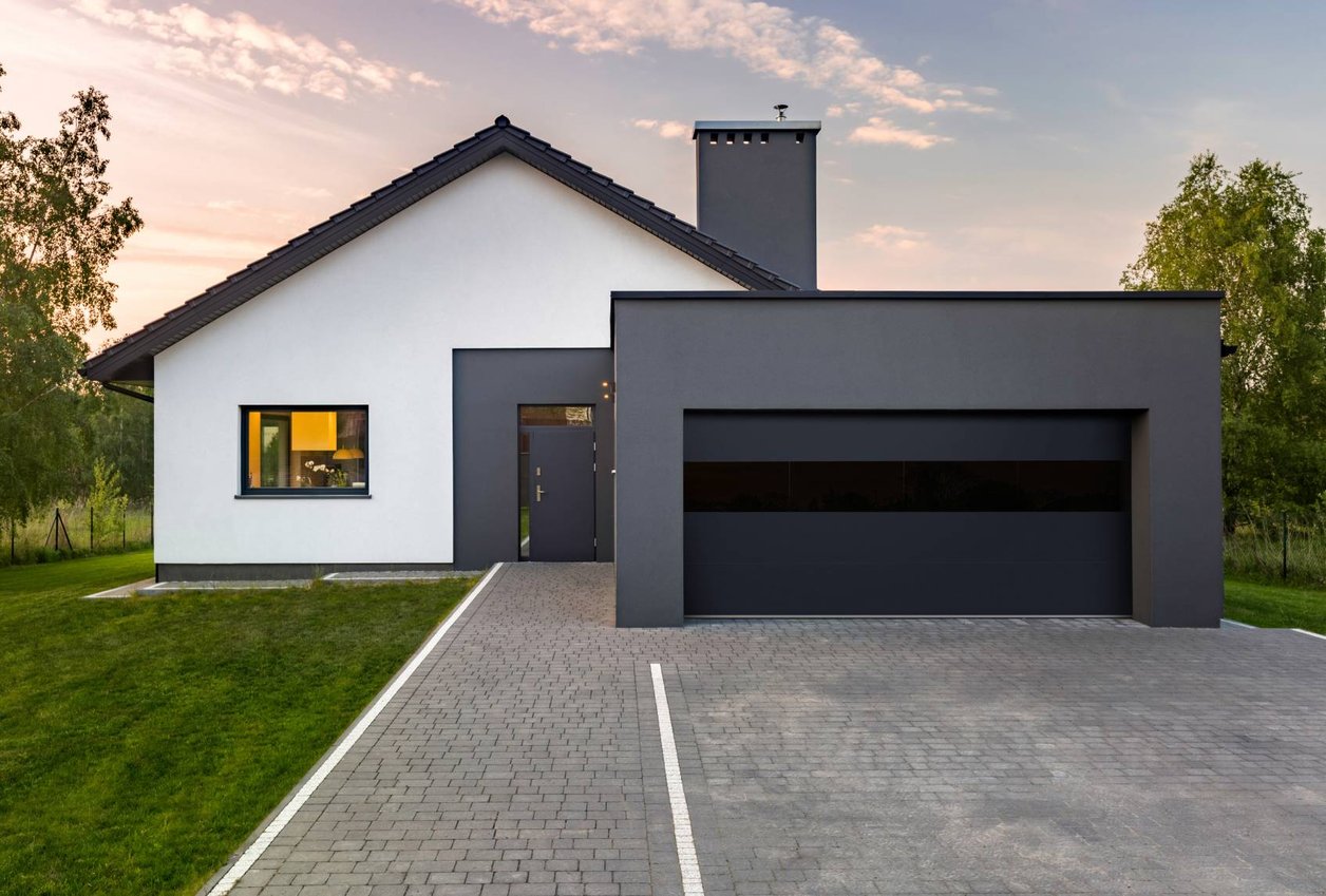 C.H.I. Sterling steel and glass garage door on a modern home