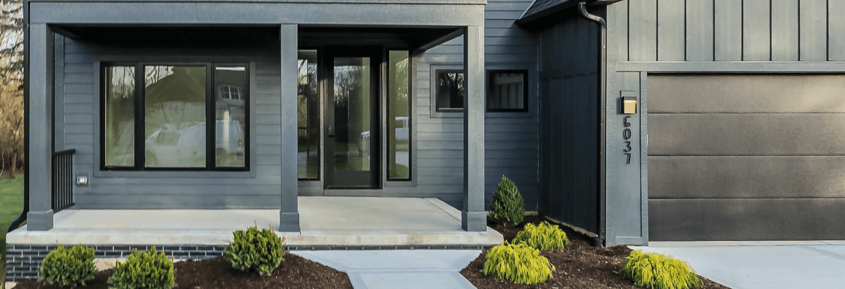 black skyline flush garage door dark home